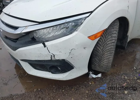 2017 Honda Civic Touring z USA, uszkodzony, nr VIN 19XFC1F9XHE032339